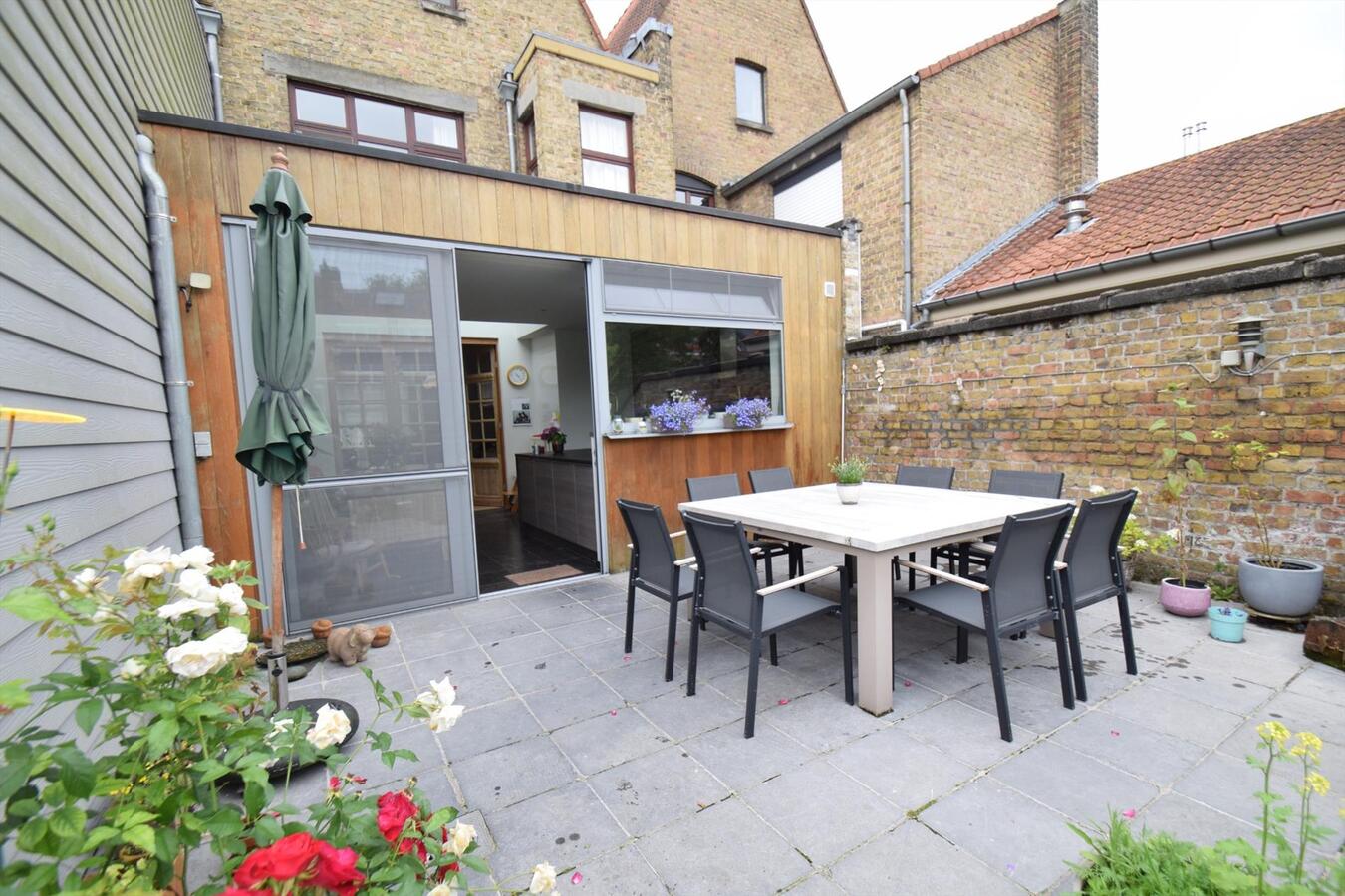 Kwalitatief gerenoveerde, ruime 4-slpk-woning met toffe stadstuin op Christus-Koning 