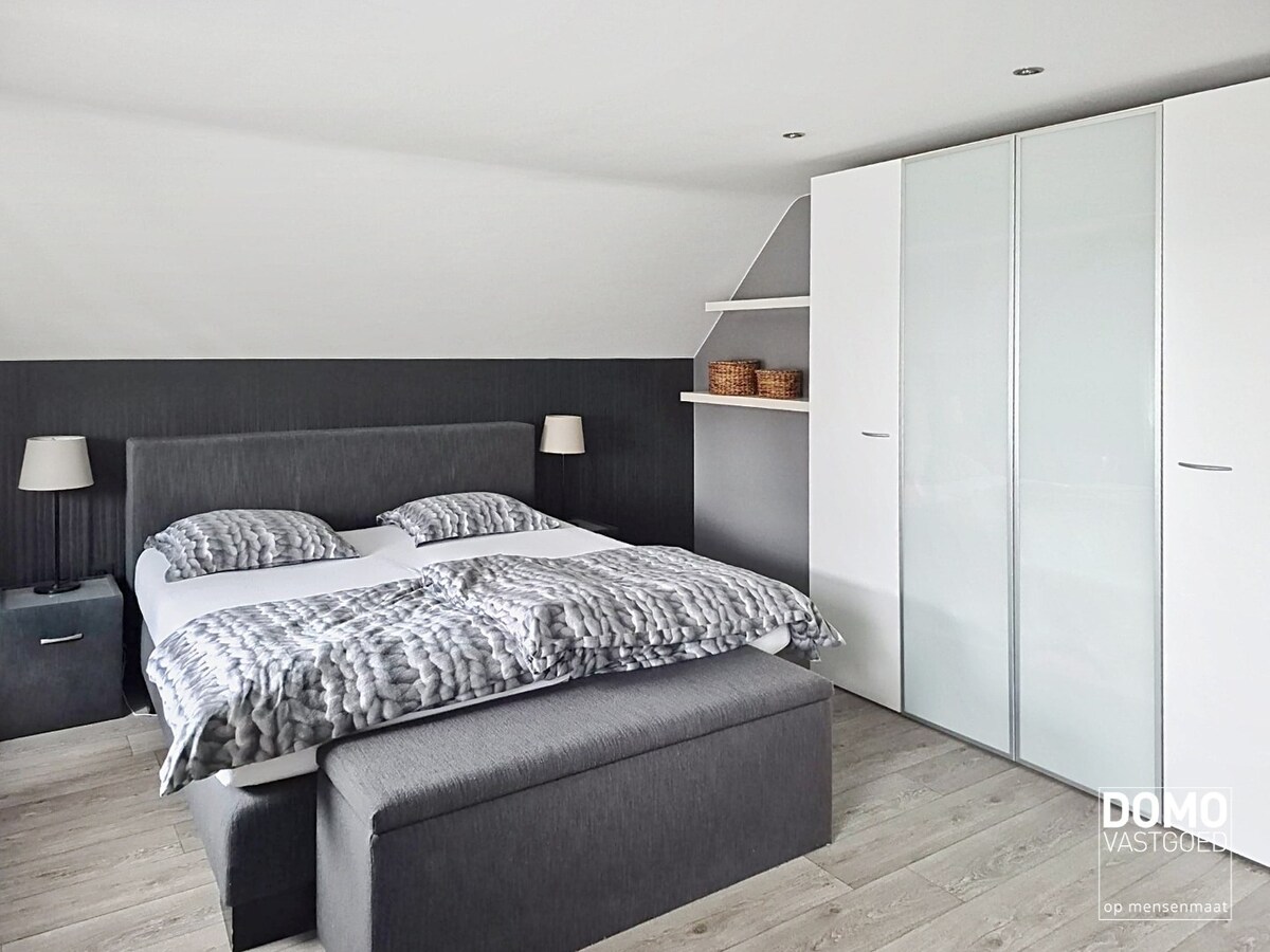 Warme gezinswoning met prachtige tuin in hartje Kortessem 