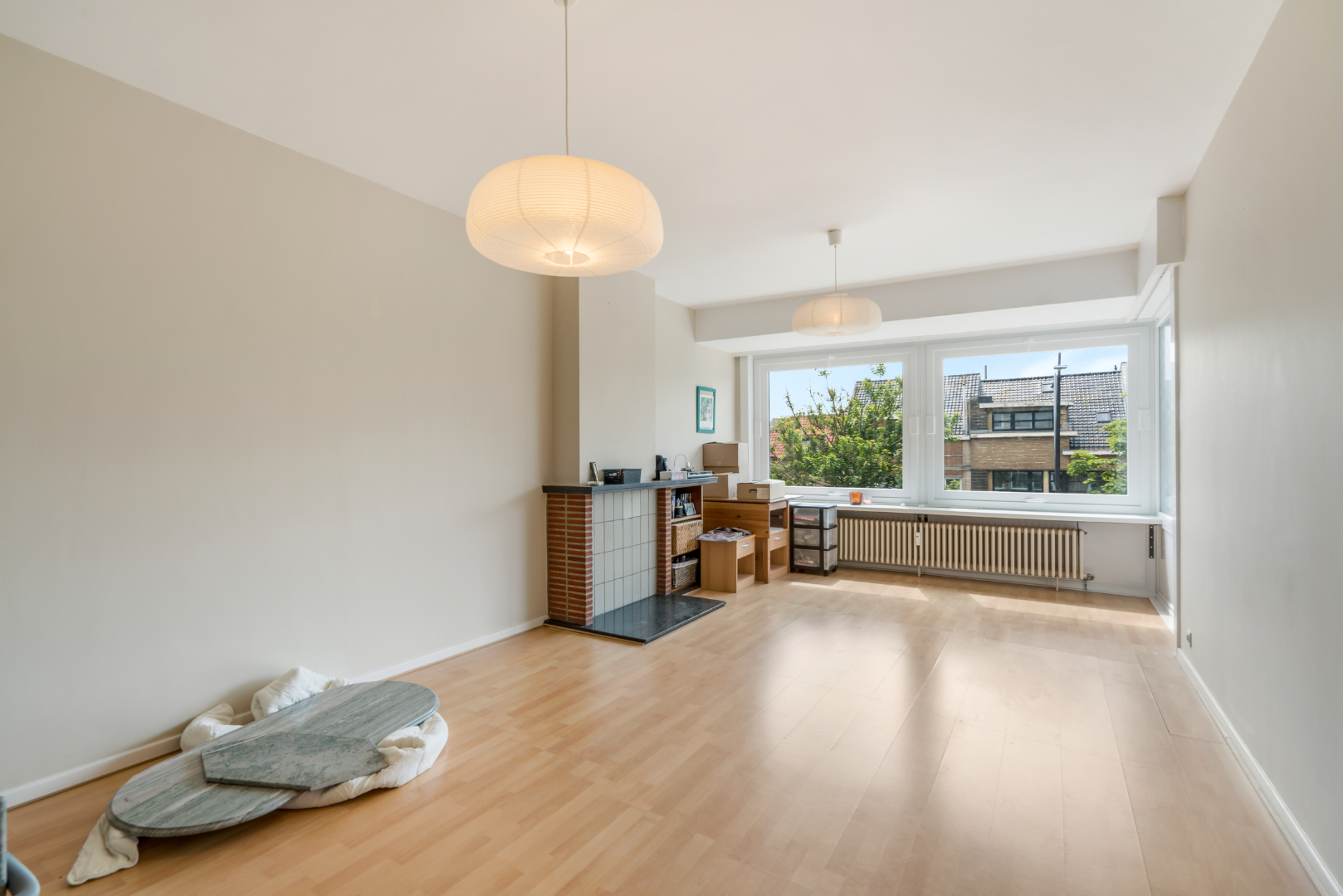 OPBRENGSTEIGENDOM MET 7 APPARTEMENTEN EN 7 GARAGEBOXEN 