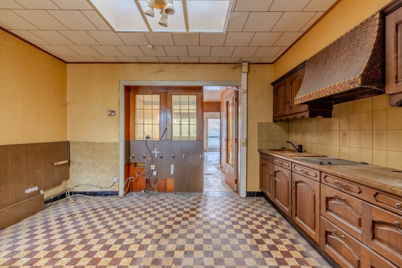 Te renoveren woning met 2 slpk en stadstuin 