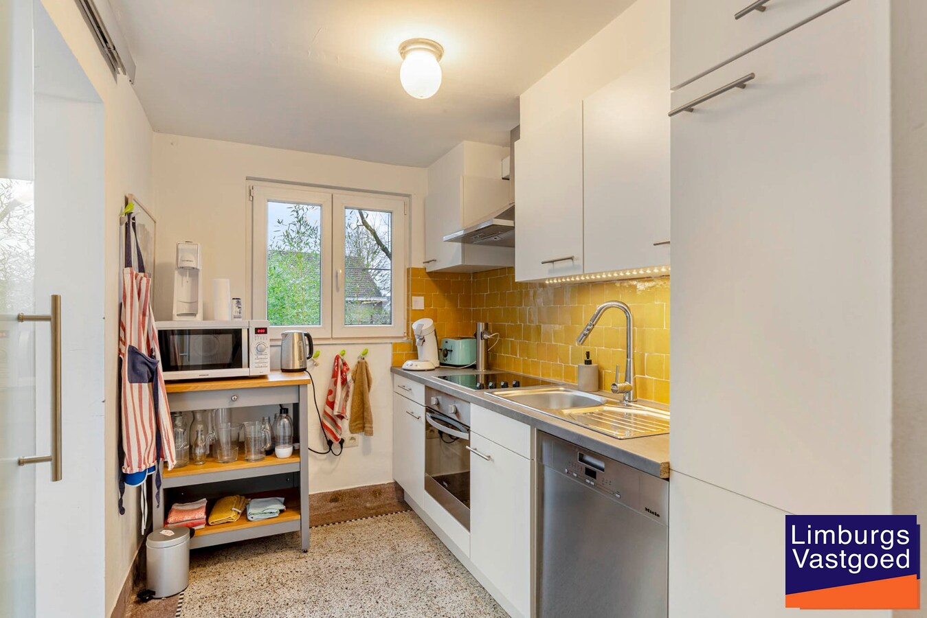 Woonhuis met  praktijkruimte te Waterschei, op een perceel van 6a80ca te Genk 