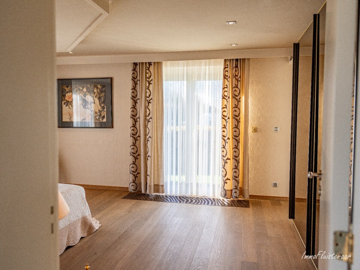 Rural villa with multifunctional outbuilding on approximately 51 acres in Bilzen 