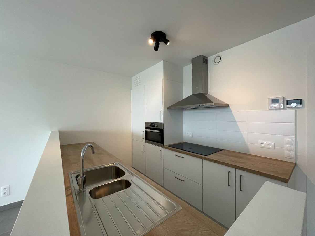 Appartement met één slaapkamer en autostaanplaats in rustige residentie! 