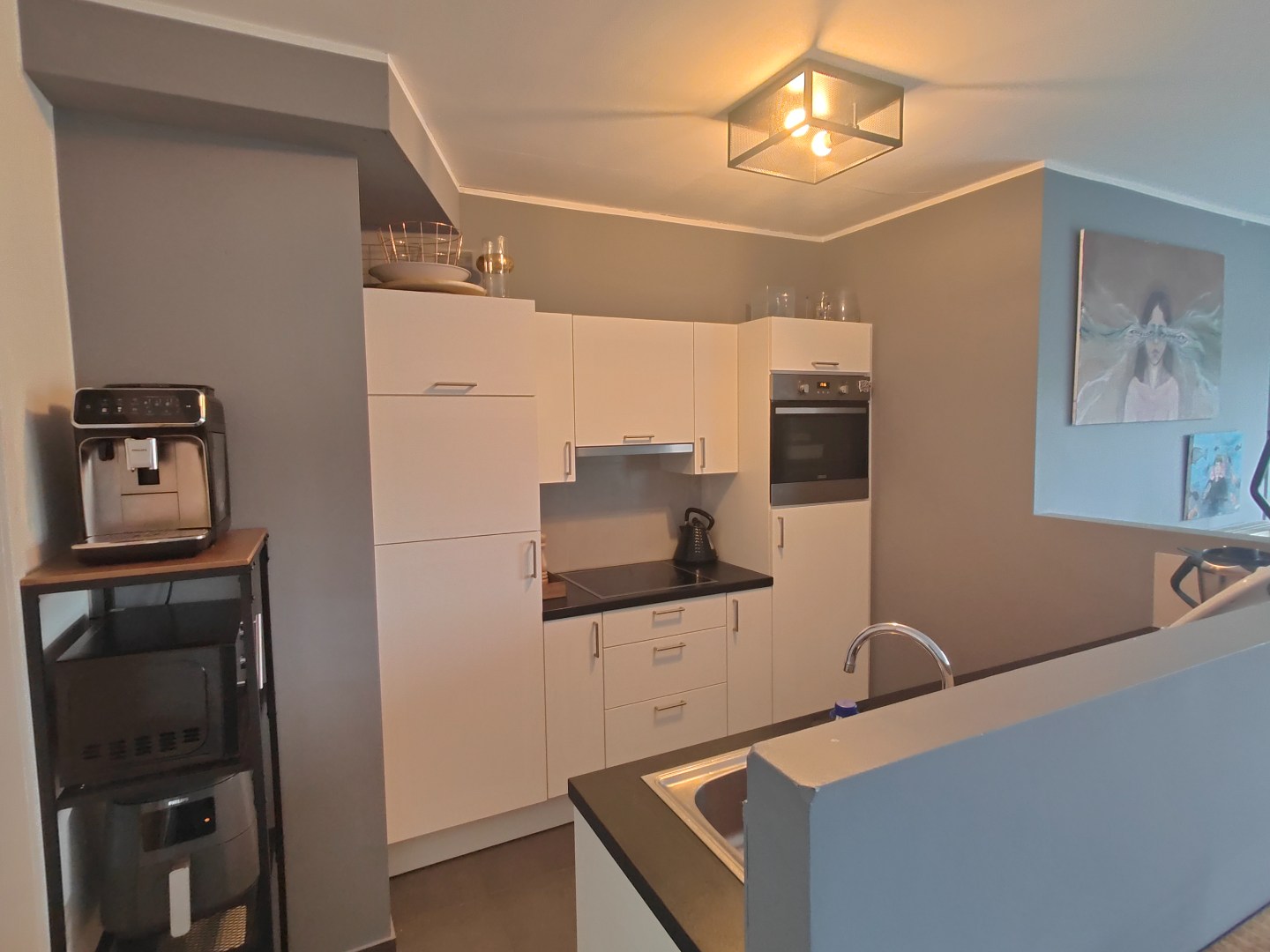 Verzorgd appartement met 2 slaapkamers en garage 