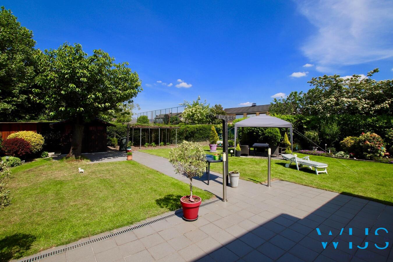 Super gezellig en ruim woonhuis met prachtige zonnige tuin ! 