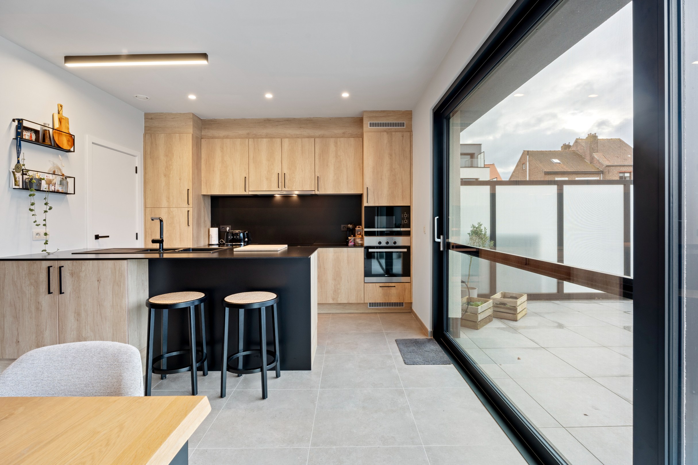 Gelijkvloers appartement met terras en tuin 