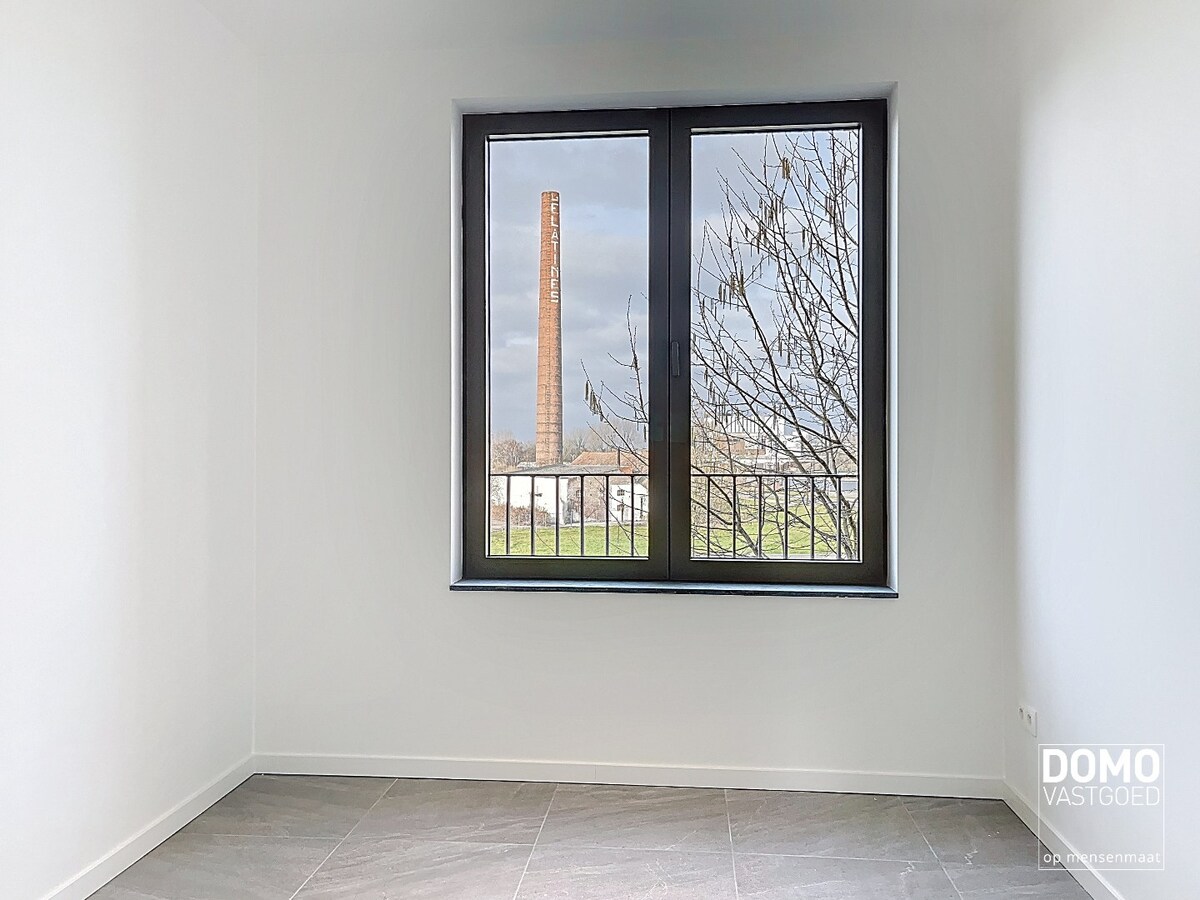 PRACHTIG APPARTEMENT MET ZONNIG TERRAS, 2 SLAAPKAMERS EN GARAGEBOX TE HUUR IN HET CENTRUM VAN HASSELT 