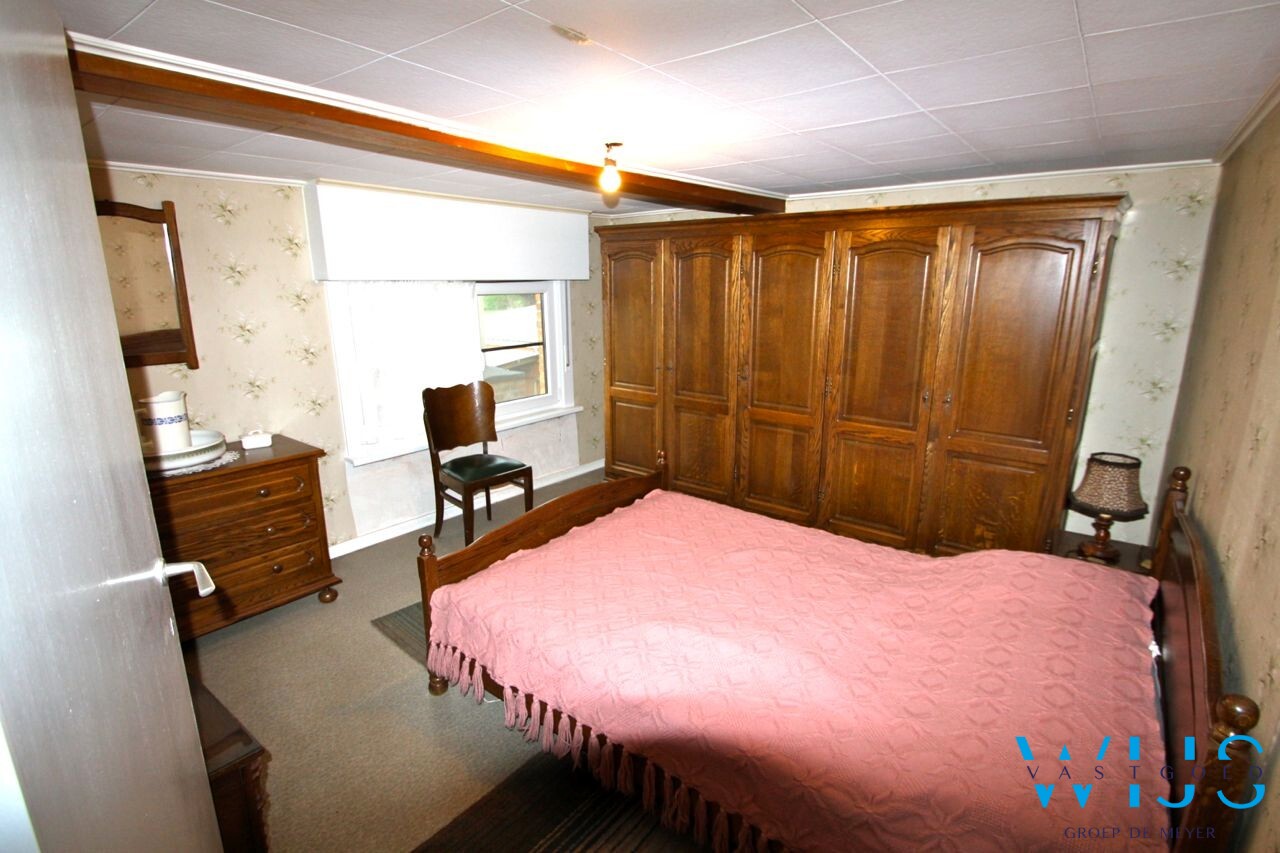 Centraal gelegen woning met mooie grond te Ertvelde! 