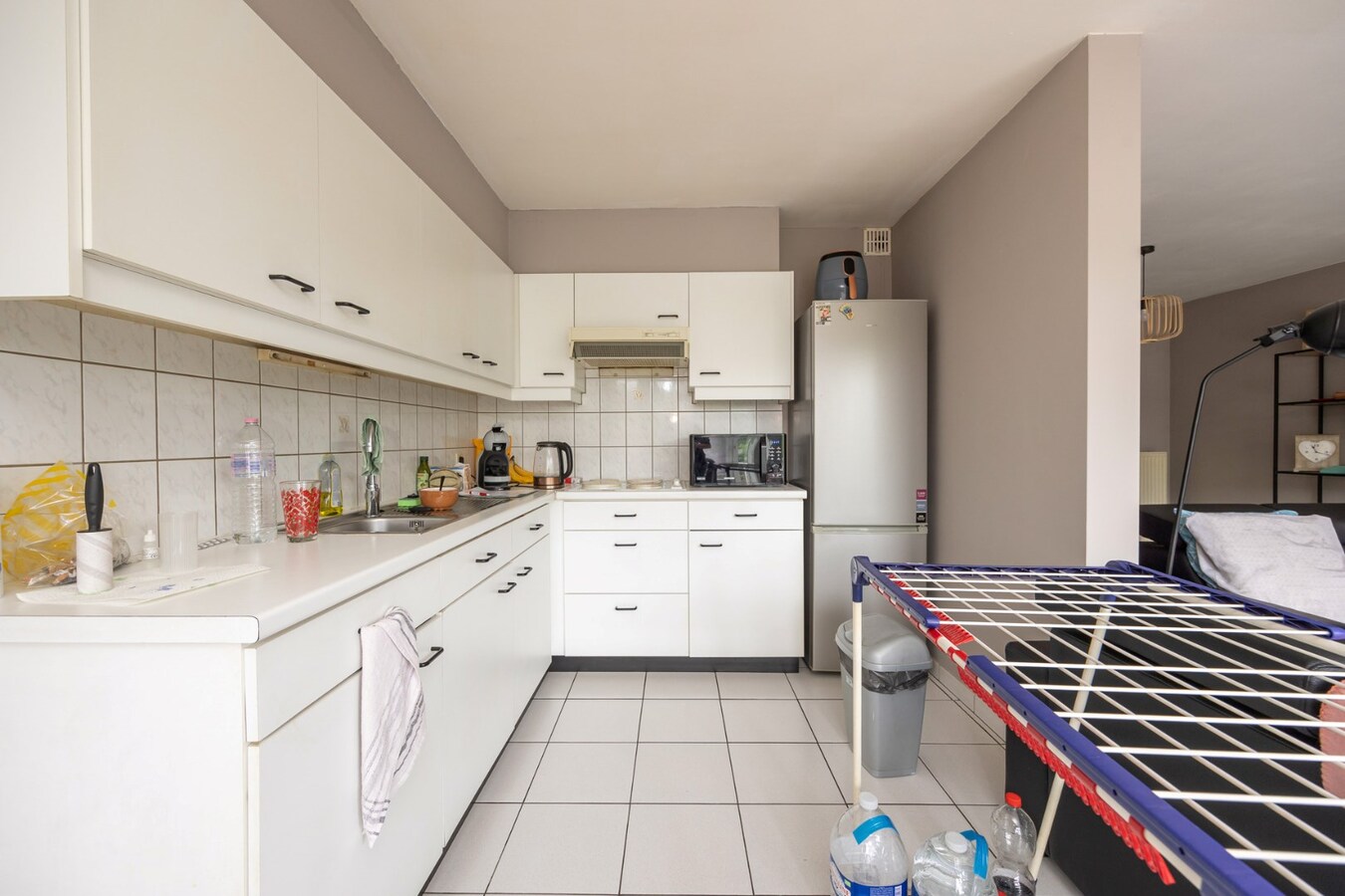 Opbrengsteigendom met 5 appartementen en 3 garages 