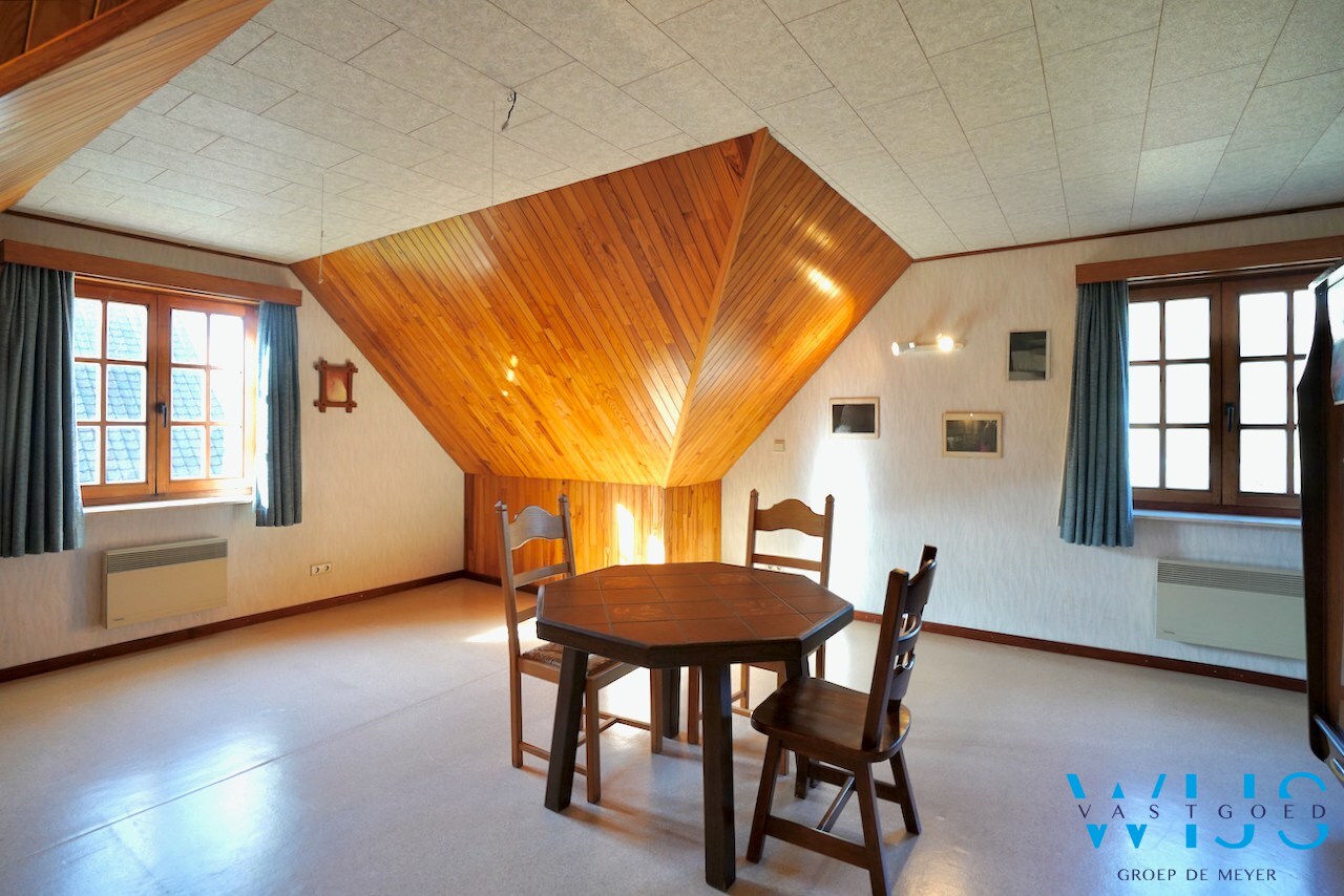 Fantastische open bebouwing met dubbele garage in gegeerde woonwijk te Evergem 