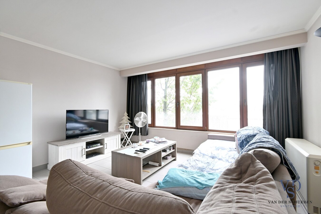 Degelijk investeringsappartement met garage. 