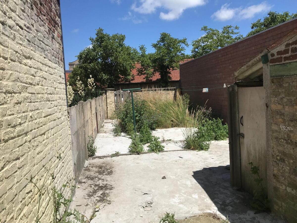 Charmante stadswoning met uitweg achteraan 