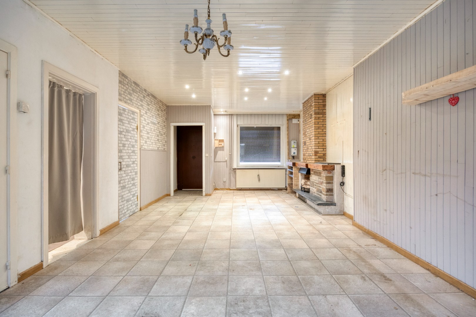 Te renoveren woning met 4 slpk. en gezellige stadstuin op een centrale ligging in Geel 