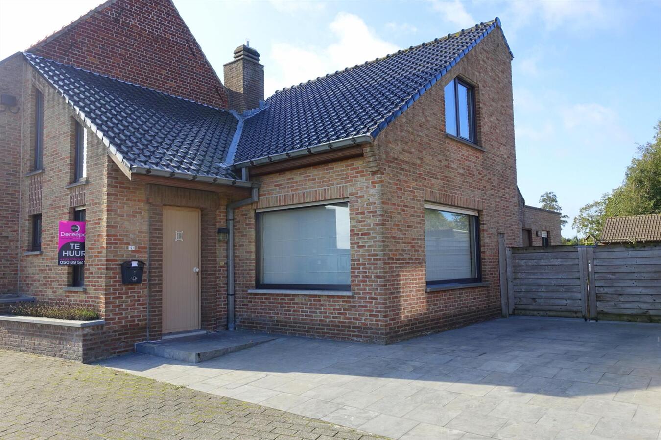 Gezellige half-open woning met zonnige tuin 
