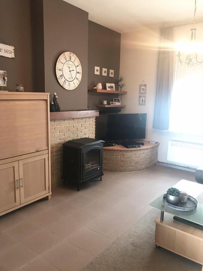 KNAP GERENOVEERDE RUIME WONING MET ZONNIGE STADSTUIN 