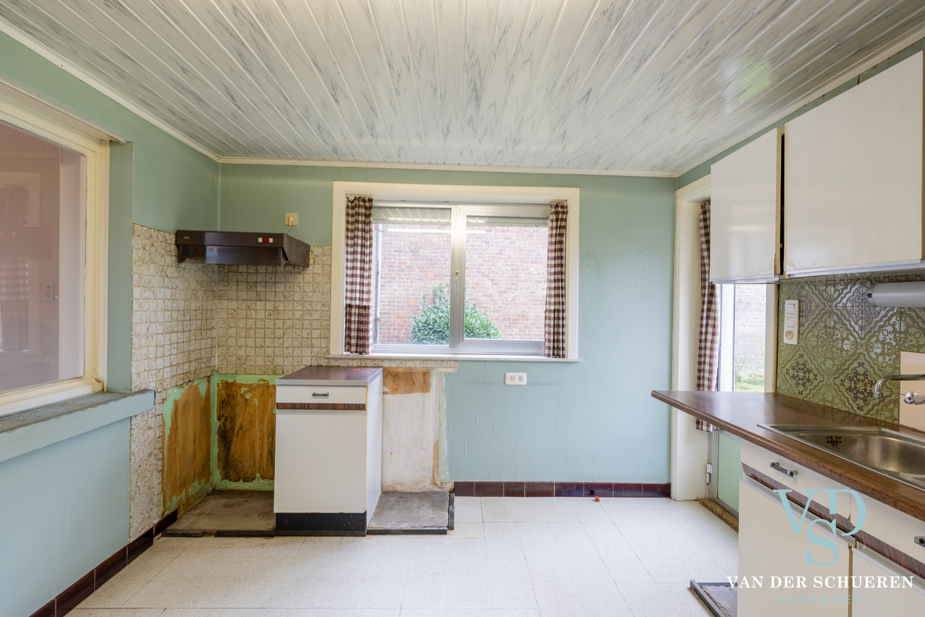 Statige herenwoning met potentieel ! 