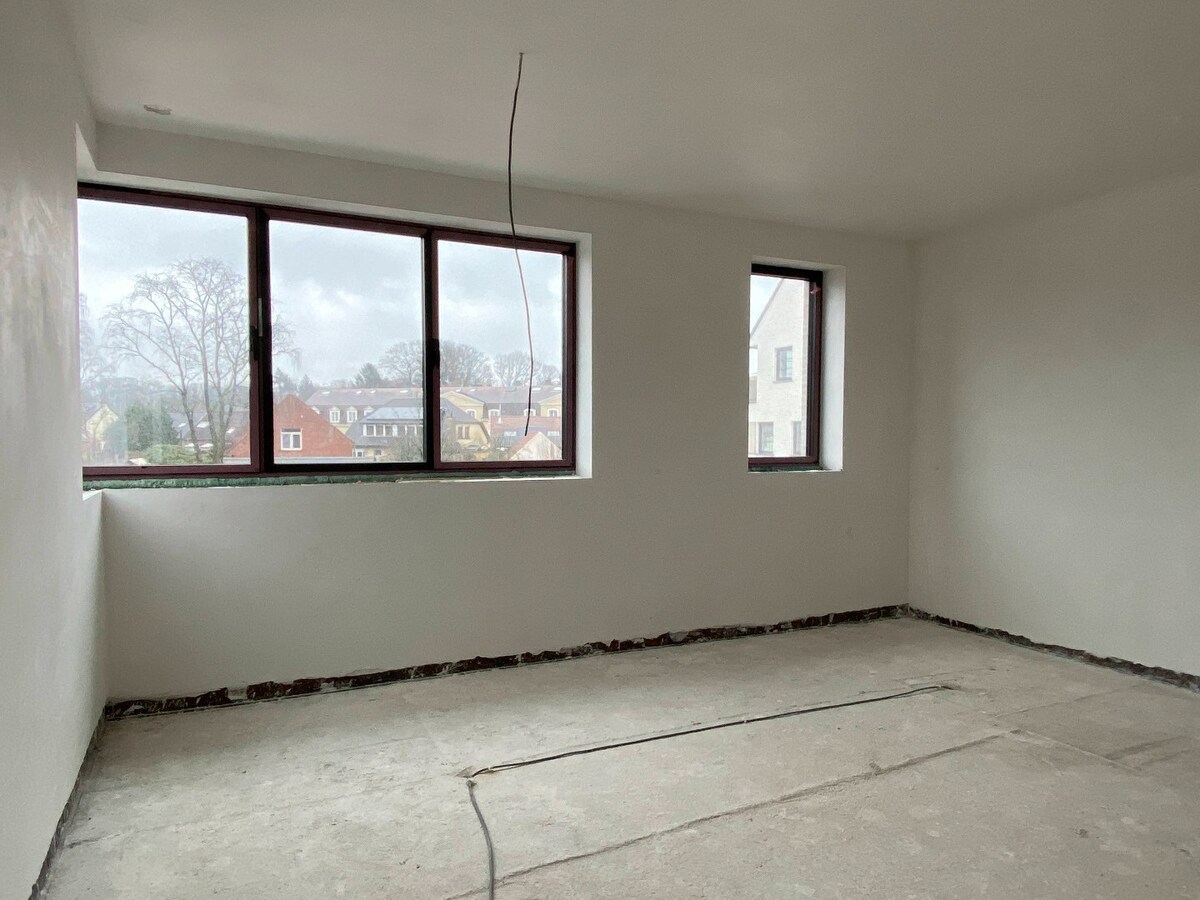 Luxueus én energieneutraal nieuwbouw villa-appartement  van 168 m² met 3 slaapkamers + 2 ondergrondse staanplaatsen + ruime kelder in kleine residentie te Schilde 