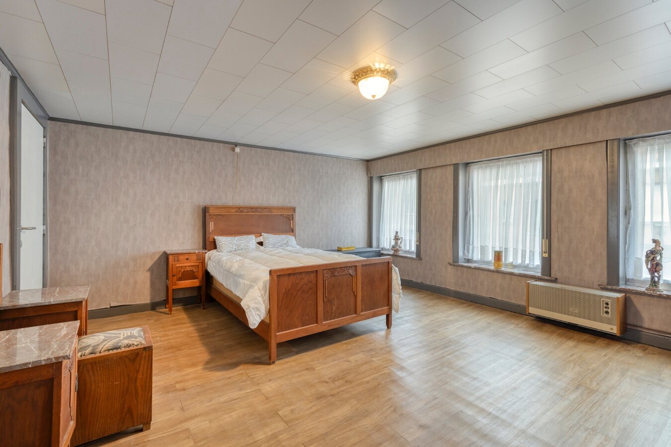 Centraal gelegen woning met stadstuin en veel potentieel in Ronse 
