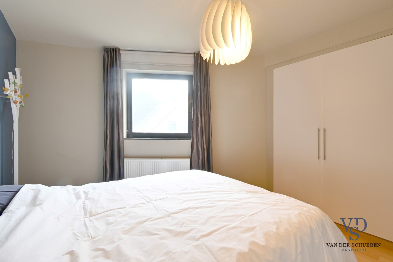 Ruim appartement in hartje Zingem. 