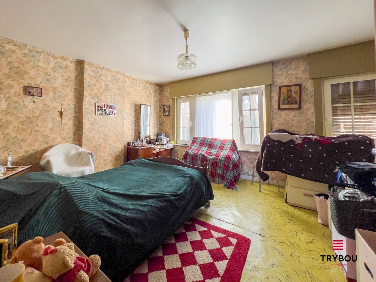 Ruime gezinswoning met 4 slaapkamers, garage en tuin 