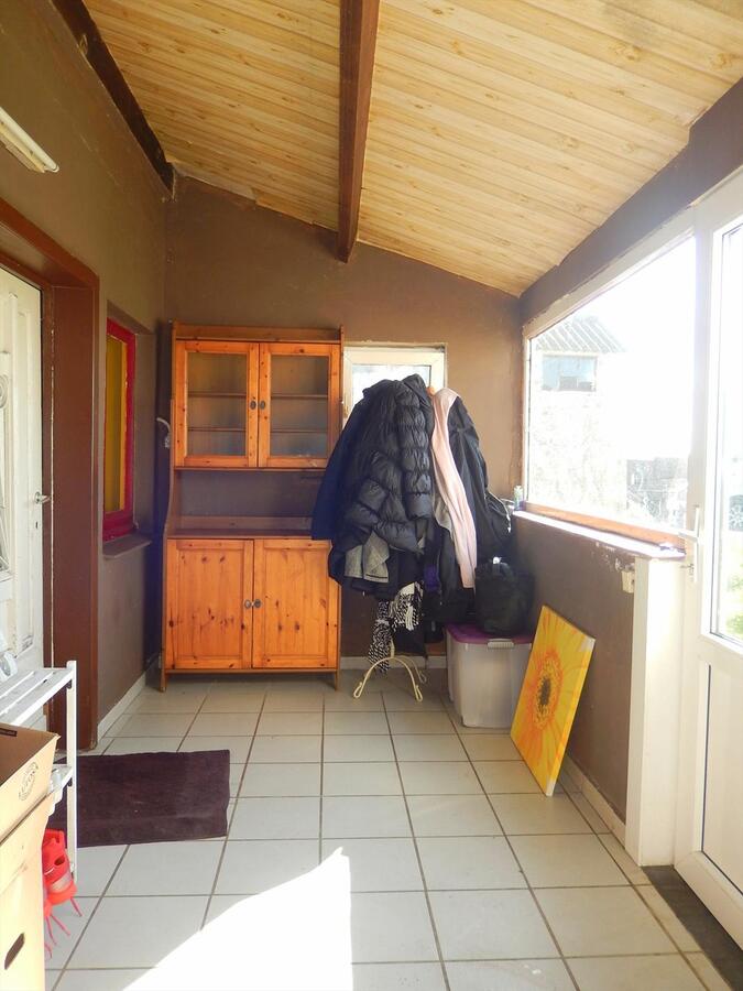 Te renoveren woning in de landelijke velden te Eernegem 