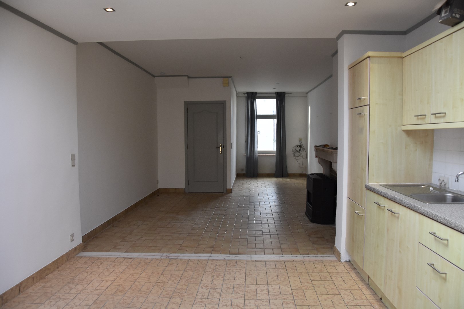 Opgefriste rijwoning met stadskoertje 