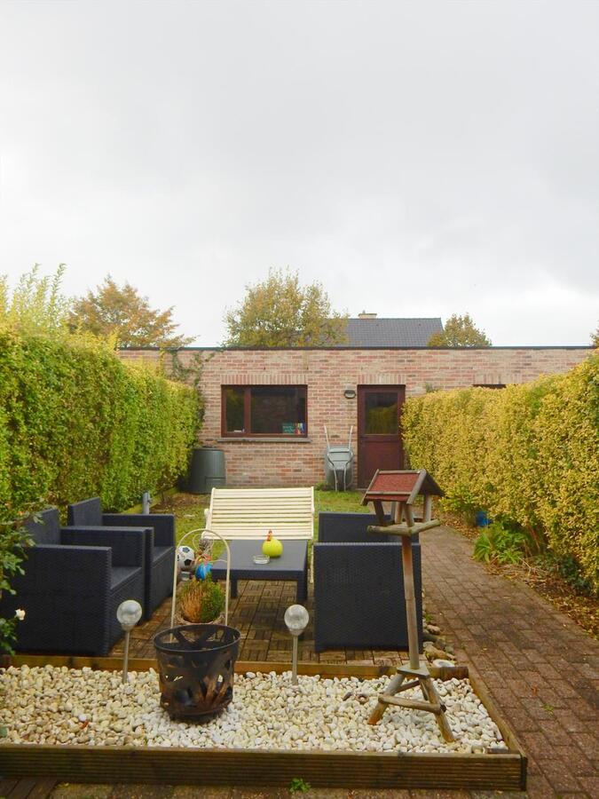 Gezellige rijwoning met tuin en een dubbele garage 