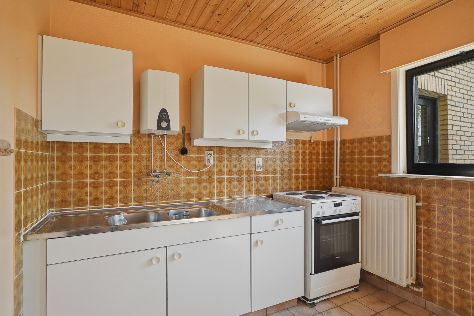 Renovatiewoning met 3 slpks, garage en zonnige tuin 