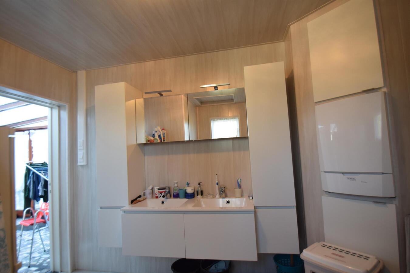 Ruime halfopen 3-slaapkamer-woning met garage en tuin 