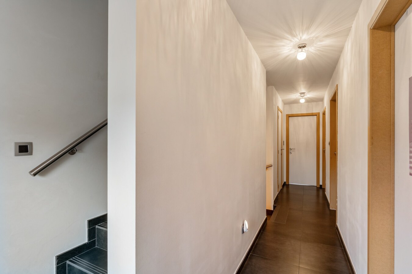 Recente, goed afgewerkte gezinswoning op een perceel van 5a15ca nabij het dorpscentrum van Opoeteren! 