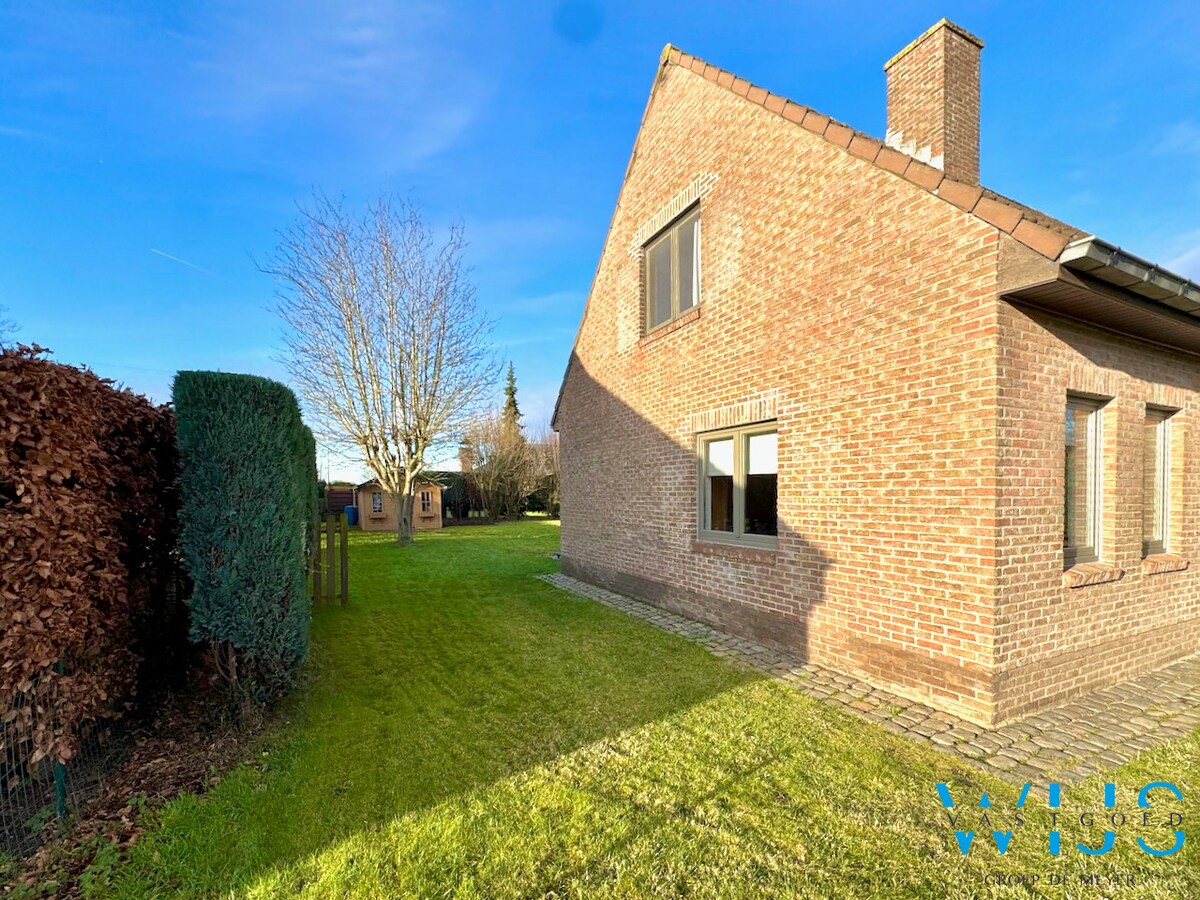 Tof woonhuis in een gekende woonwijk te Evergem 