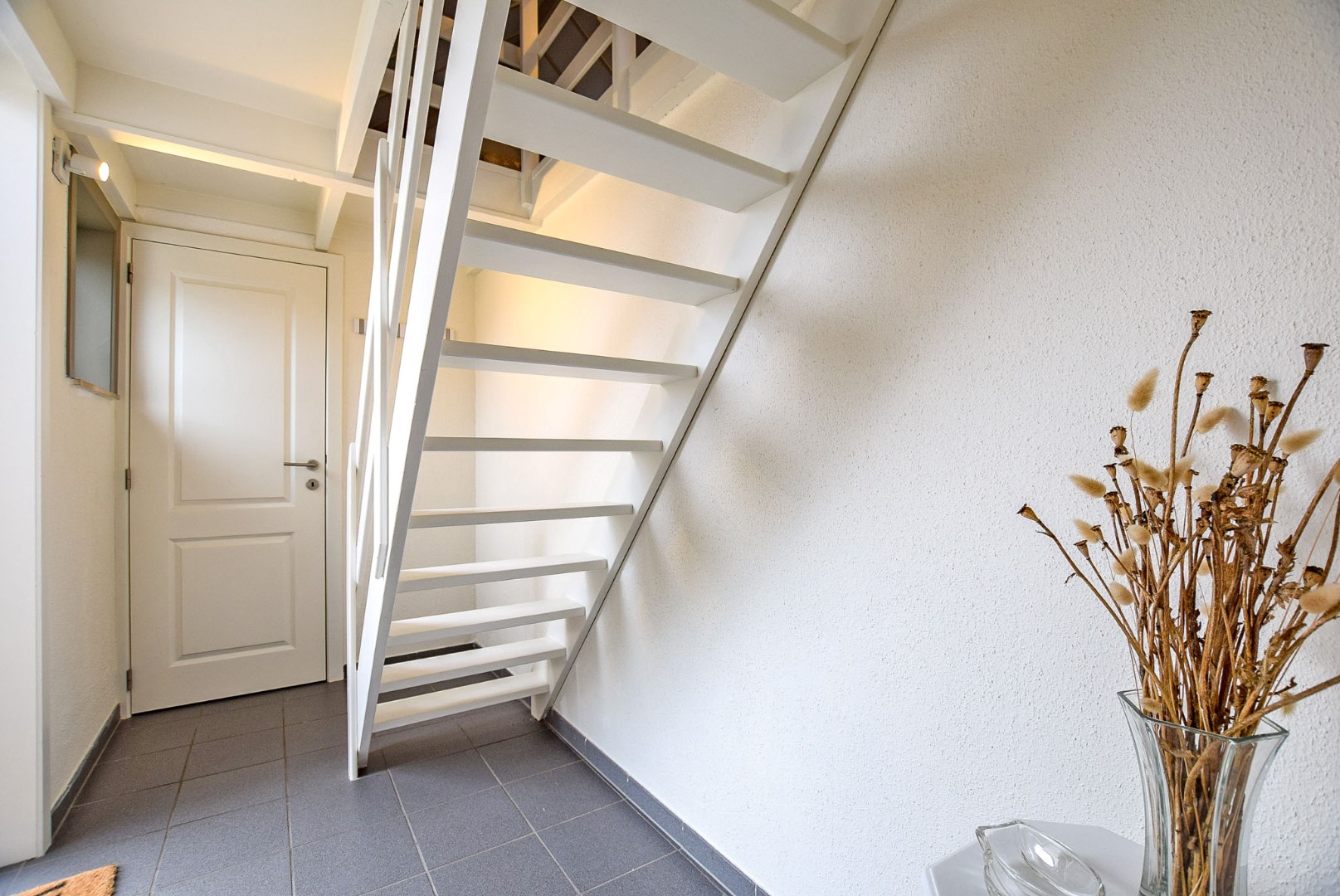 Prachtig onderhouden vakantiewoning (type vissershuis) met 3 slaapkamers en privé-parkeerplaats te Oostduinkerke. 