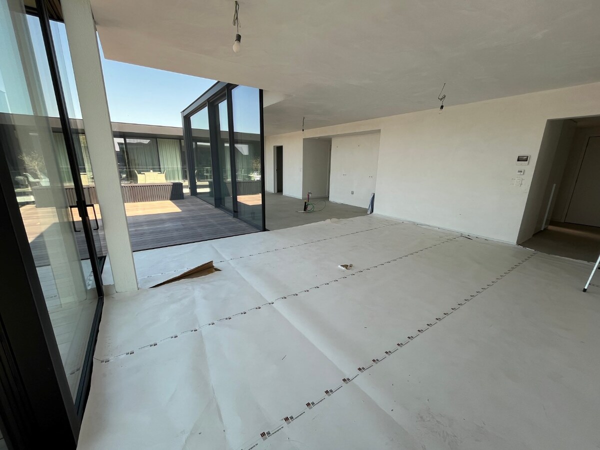 Luxe penthouse in hartje Zingem 