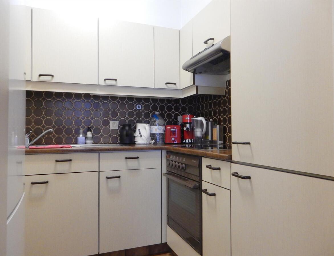 Appartement met garage en grote tuin 