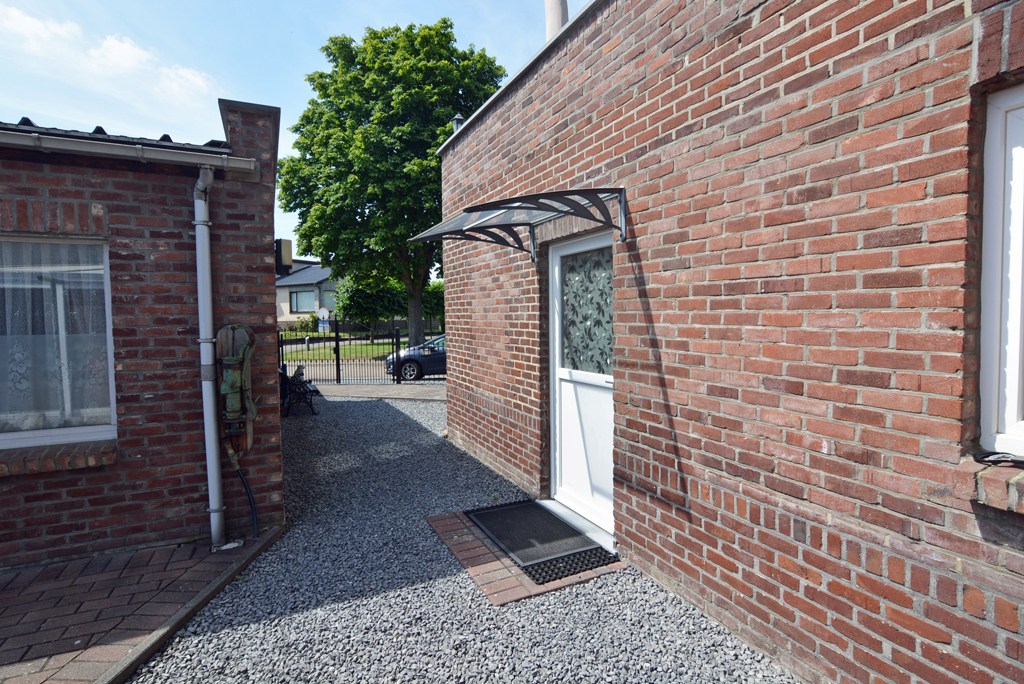 Gelijkvloers appartement met 3 slpks, veranda, tuin en garage 