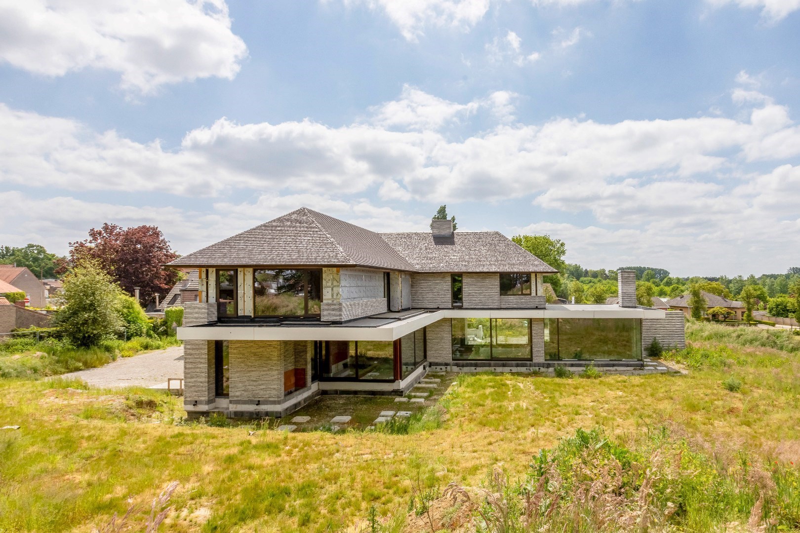 Unieke kans : exclusieve  riante villa  1400m²  by Artea en Piet Bailyu Architects 