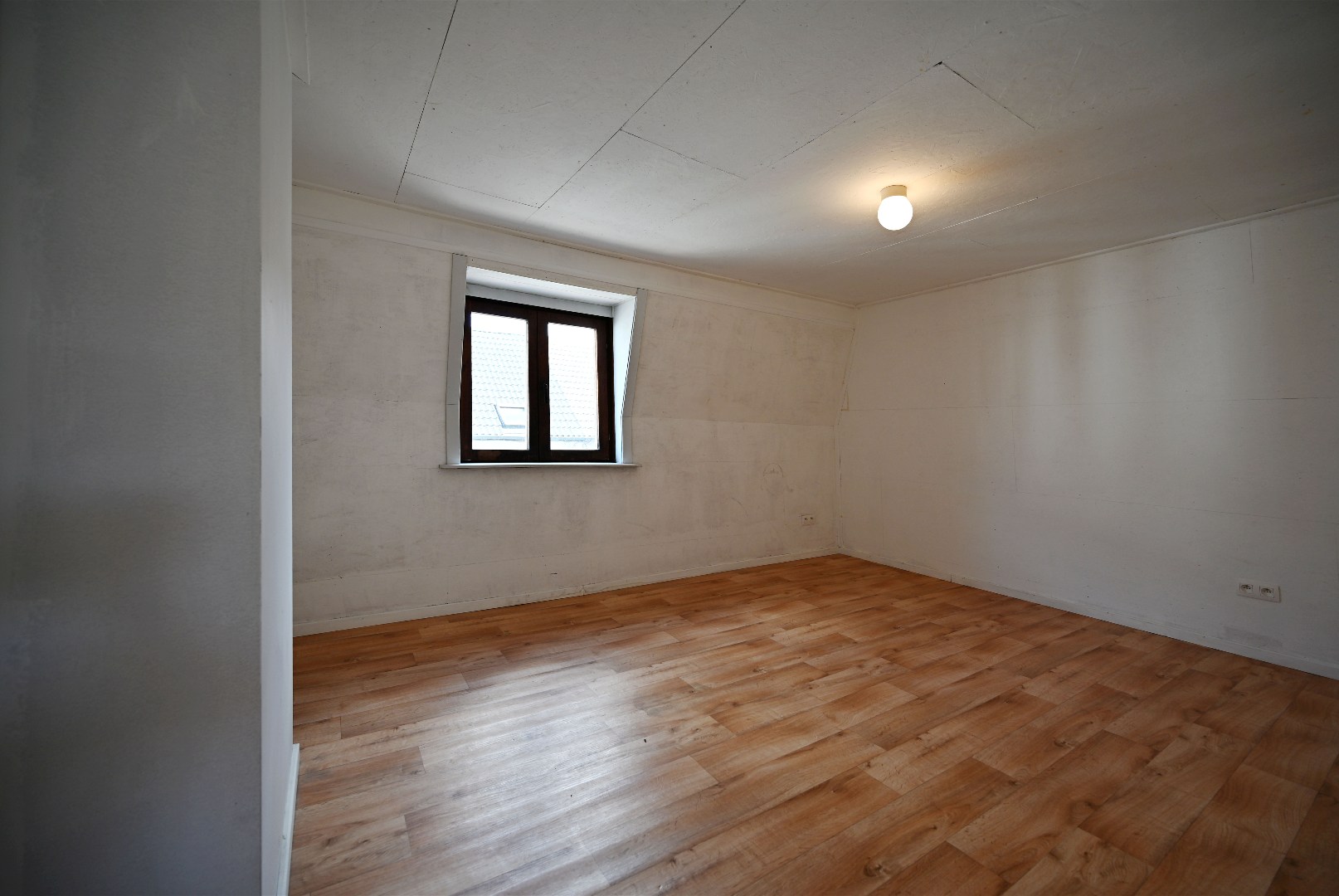 Rijwoning met 2 slaapkamers en tuintje te Eeklo 