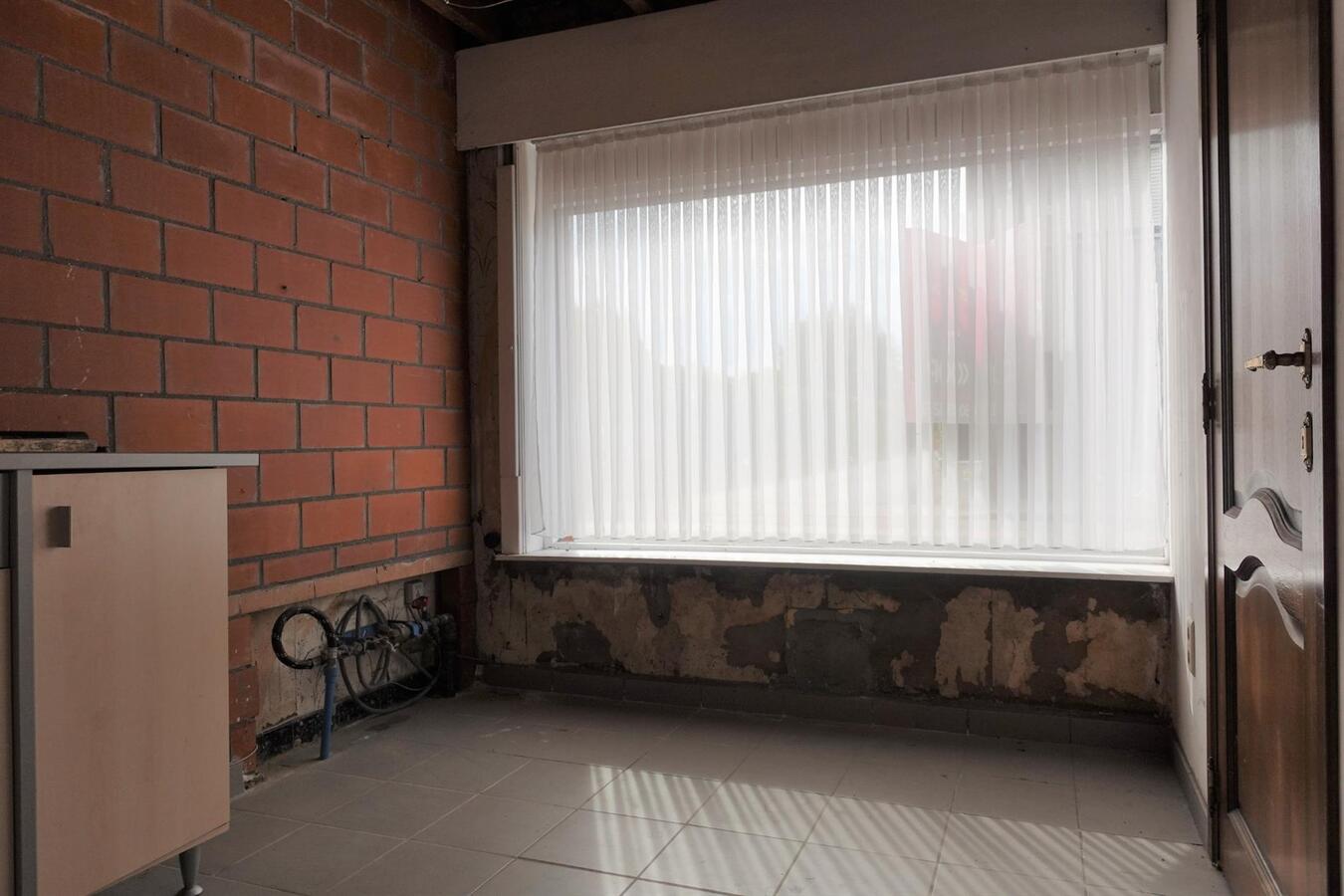 Rijwoning met tuin in centrum Eernegem 