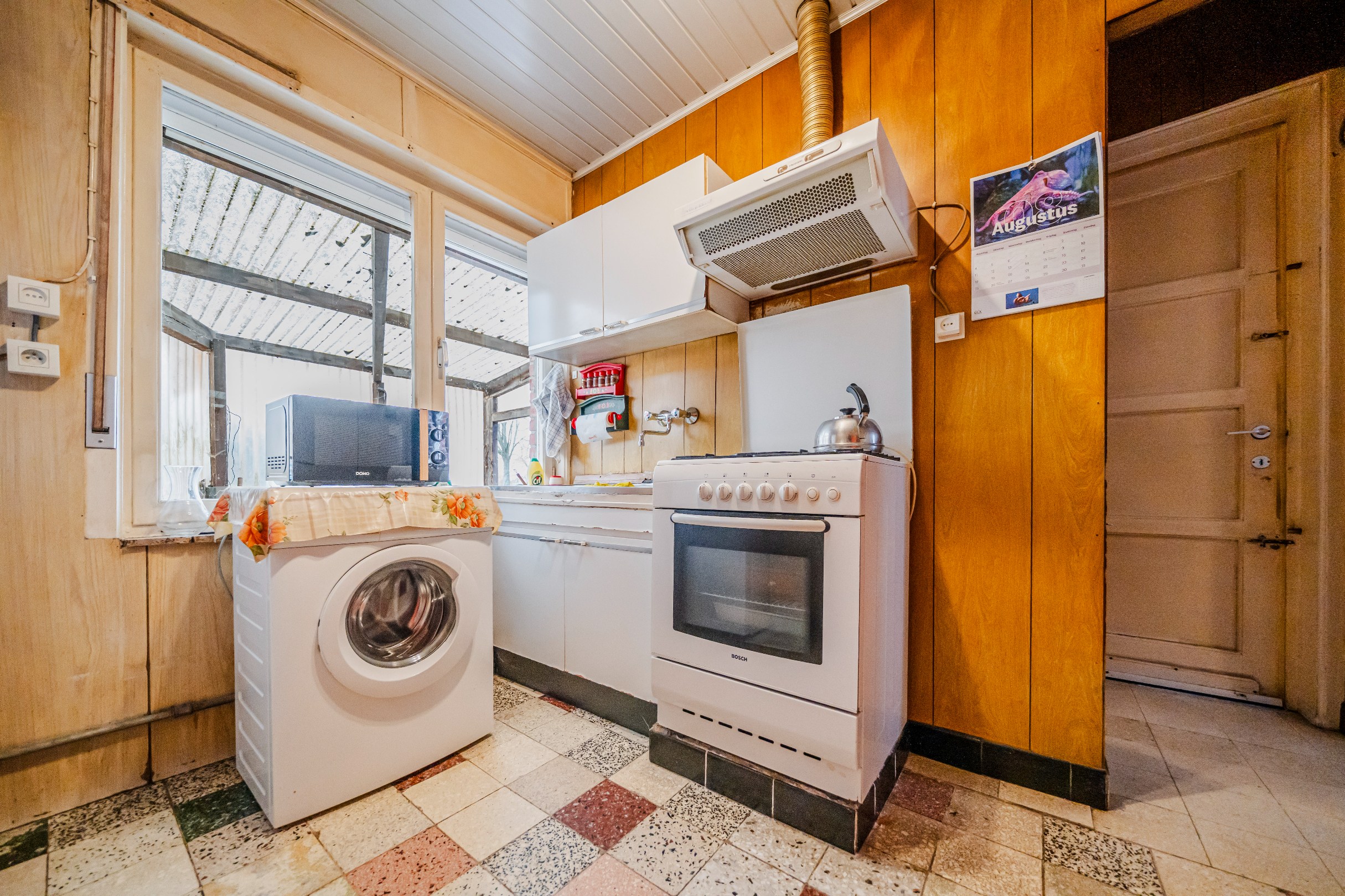 Halfopen bebouwing met 3 slaapkamers, tuin en garage. 