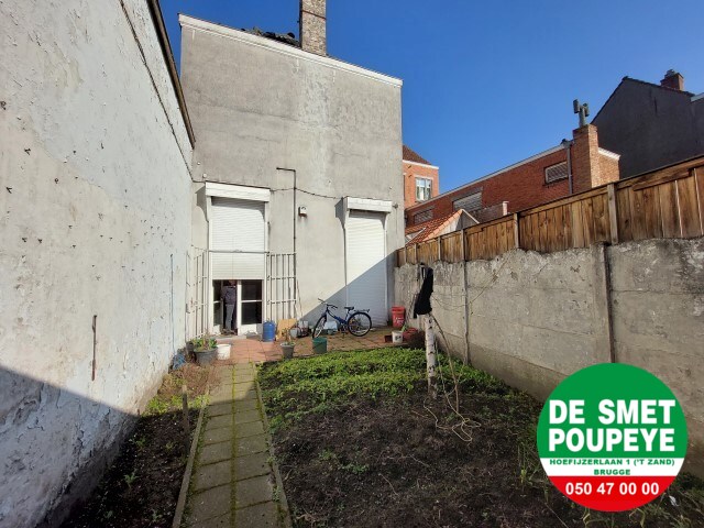 Handelshuis gelegen in de toeristische straat van Brugge 