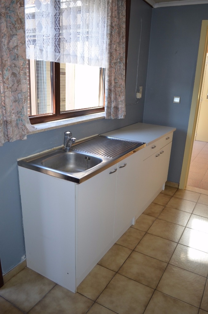 Rijwoning met 2 slpks en tuin te Adegem 