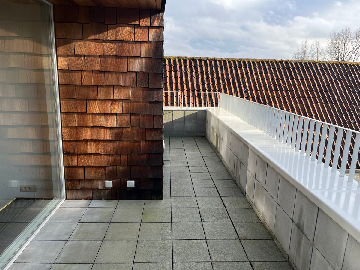 Design duplex appartement te centrum Dikkelvenne. 