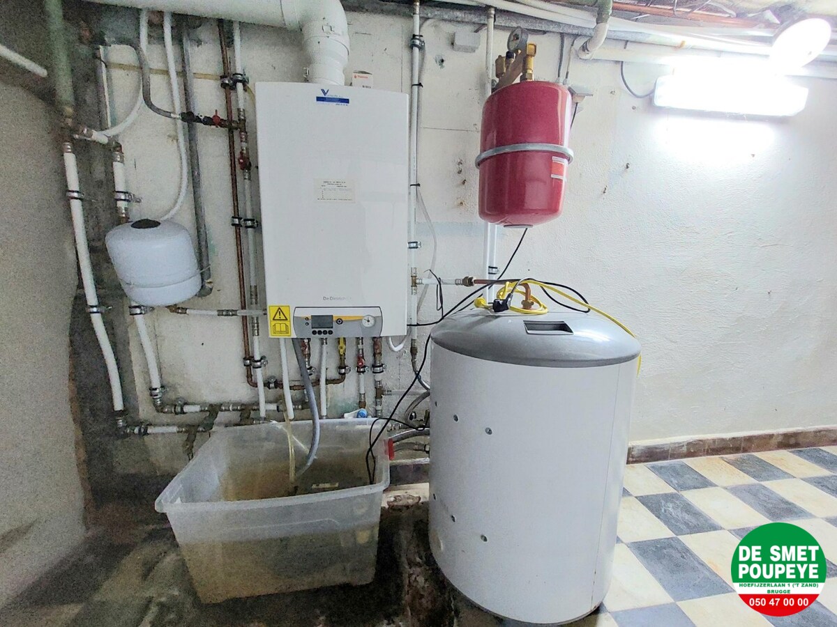 Gelijkvloersappartement met terras en garage 