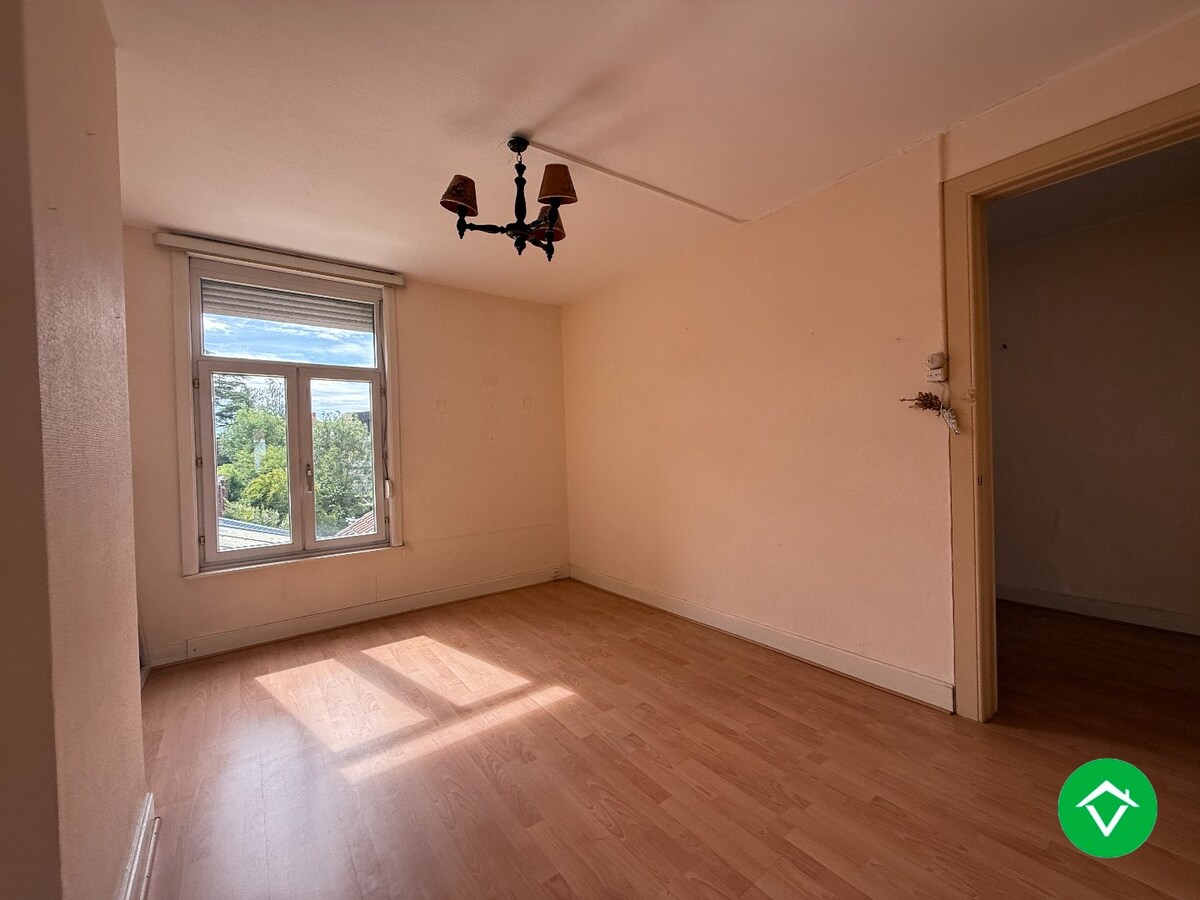 Gezellige rijwoning met 3 slaapkamers en tuin te centrum Roeselare 