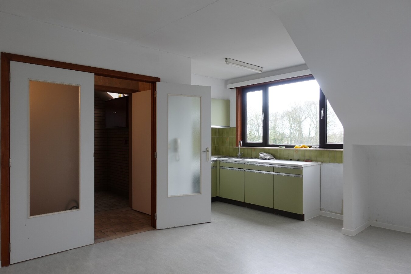 Opbrengsteigendom met 5 appartementen, 2 studio's en 4 garageboxen in Gistel 