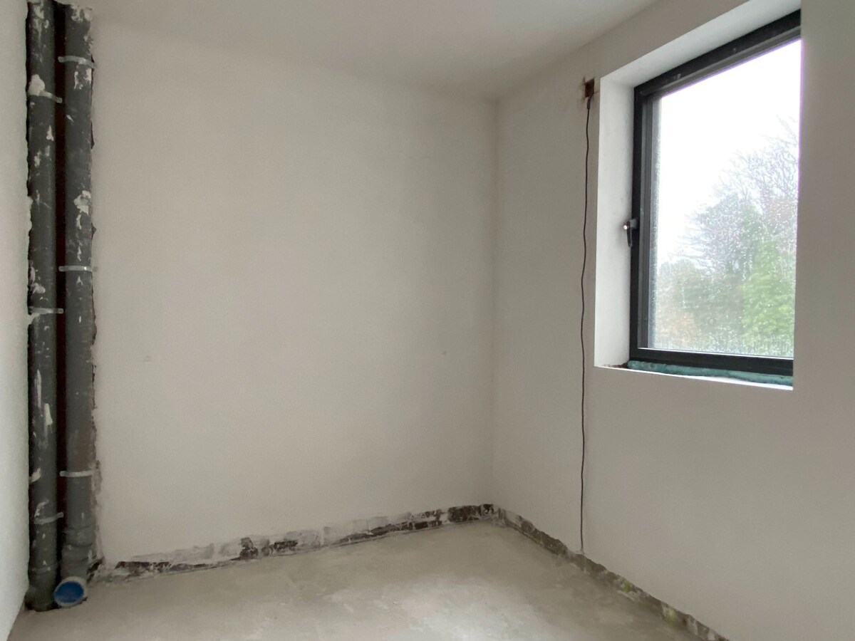 Luxueus én energieneutraal nieuwbouw villa-appartement  van 168 m² met 3 slaapkamers + 2 ondergrondse staanplaatsen + ruime kelder in kleine residentie te Schilde 