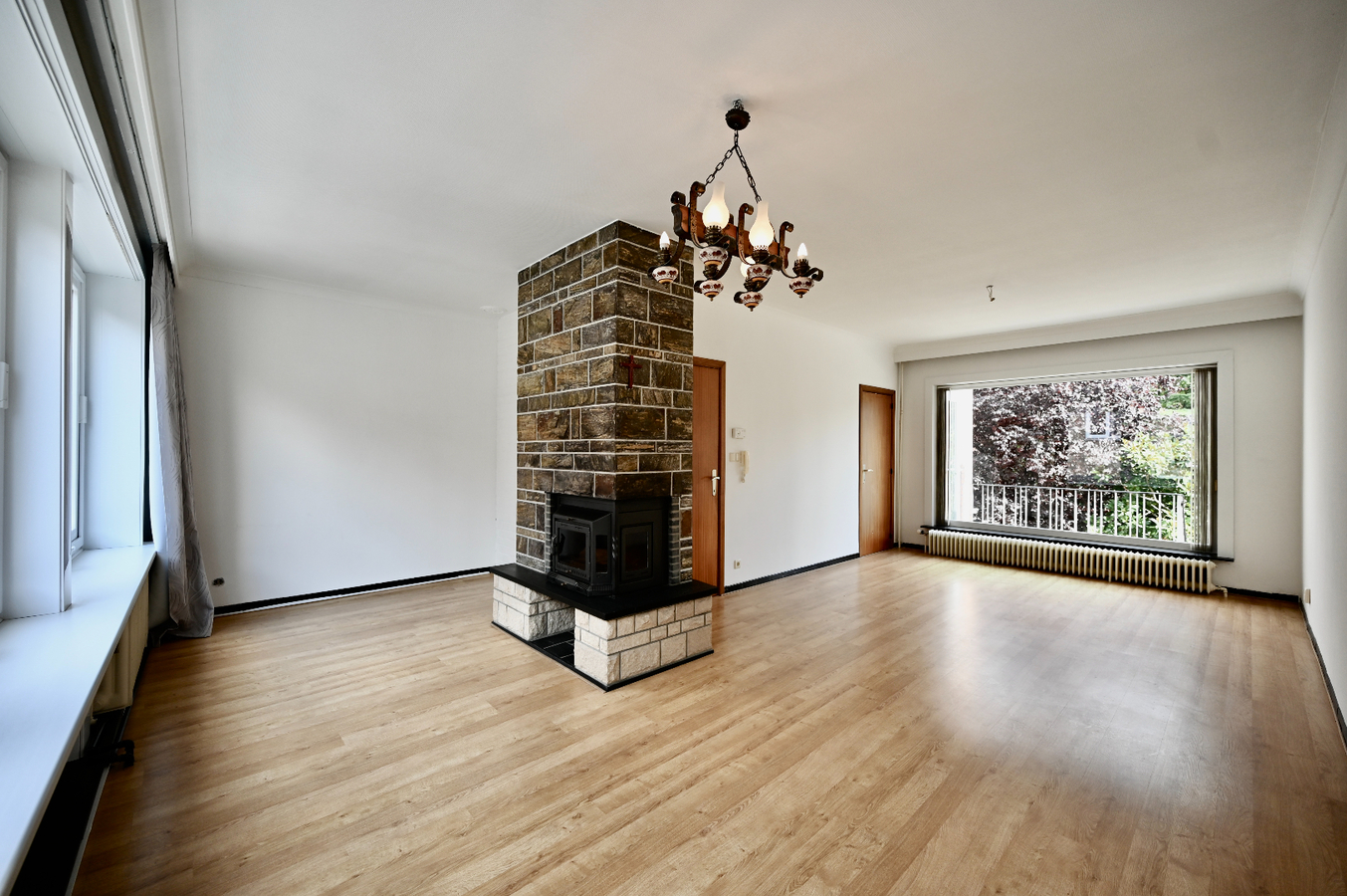 KNAPPE BEL-ETAGE WONING MET GARAGE EN ZUID-GERICHTE TUIN 