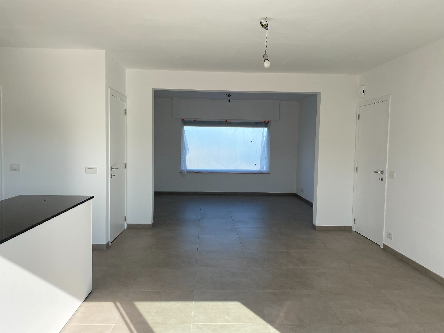 Energiezuinige halfopen woning met tuin en carport te Zulte 