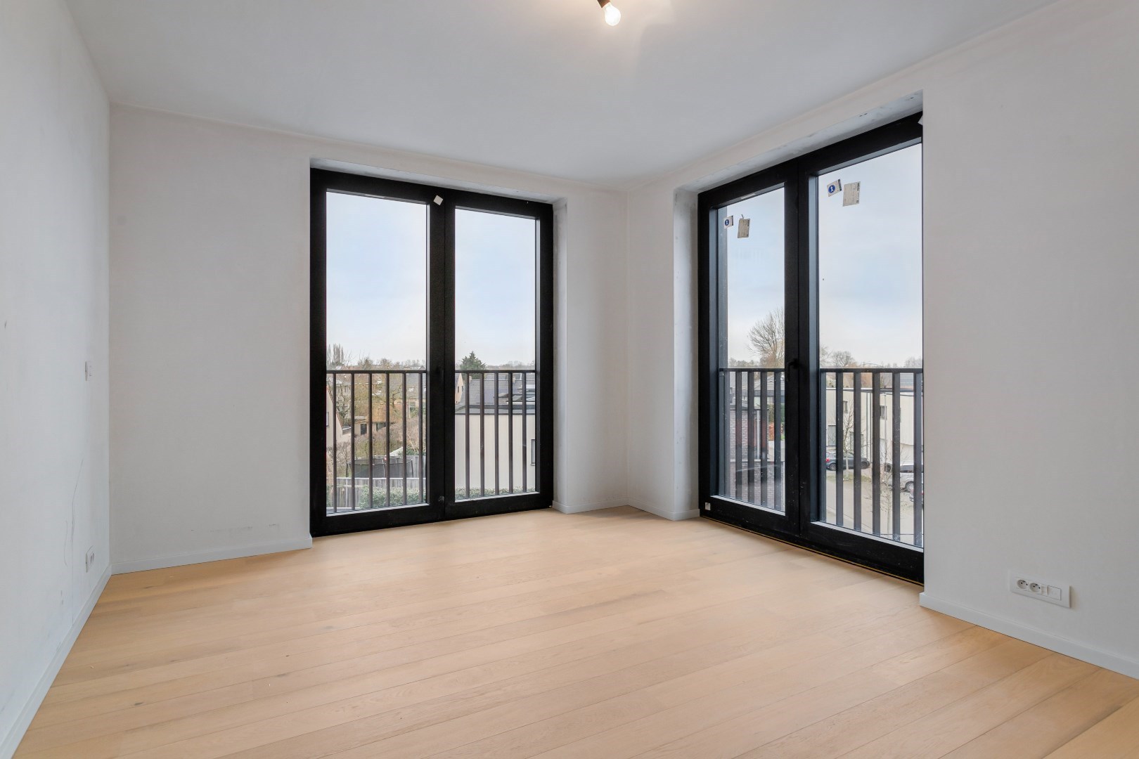 Nieuwbouwappartement met twee slaapkamers, terras en ondergrondse autostaanplaats te koop in Zulte 