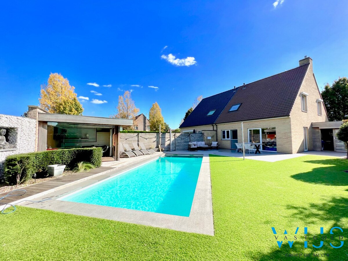 Zwemmen met zicht op de kerktoren van ERTVELDE ! 